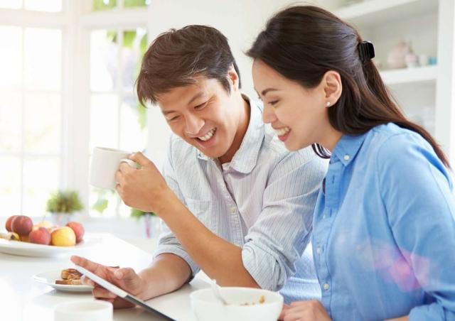 couple reviewing finances online